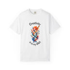 White t-shirt with colorful DNA design and 'Creativity is in my DNA' text on a white background