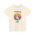 Beige t-shirt with a graphic of a dog with a fishing rod in its mouth with retro style sunset and the text 'fishing lab' on a white background