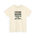 Beige t-shirt with 'Explore More Trails' text and mountain graphic on a white background