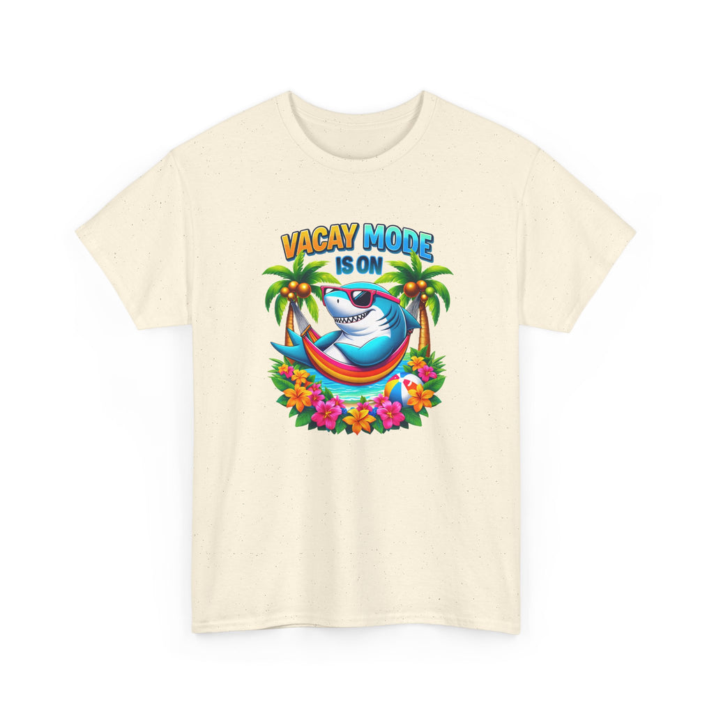 Beige t-shirt with a colorful graphic of a shark, palm trees, and flowers with 'Vacay Mode is On' text on a white background.