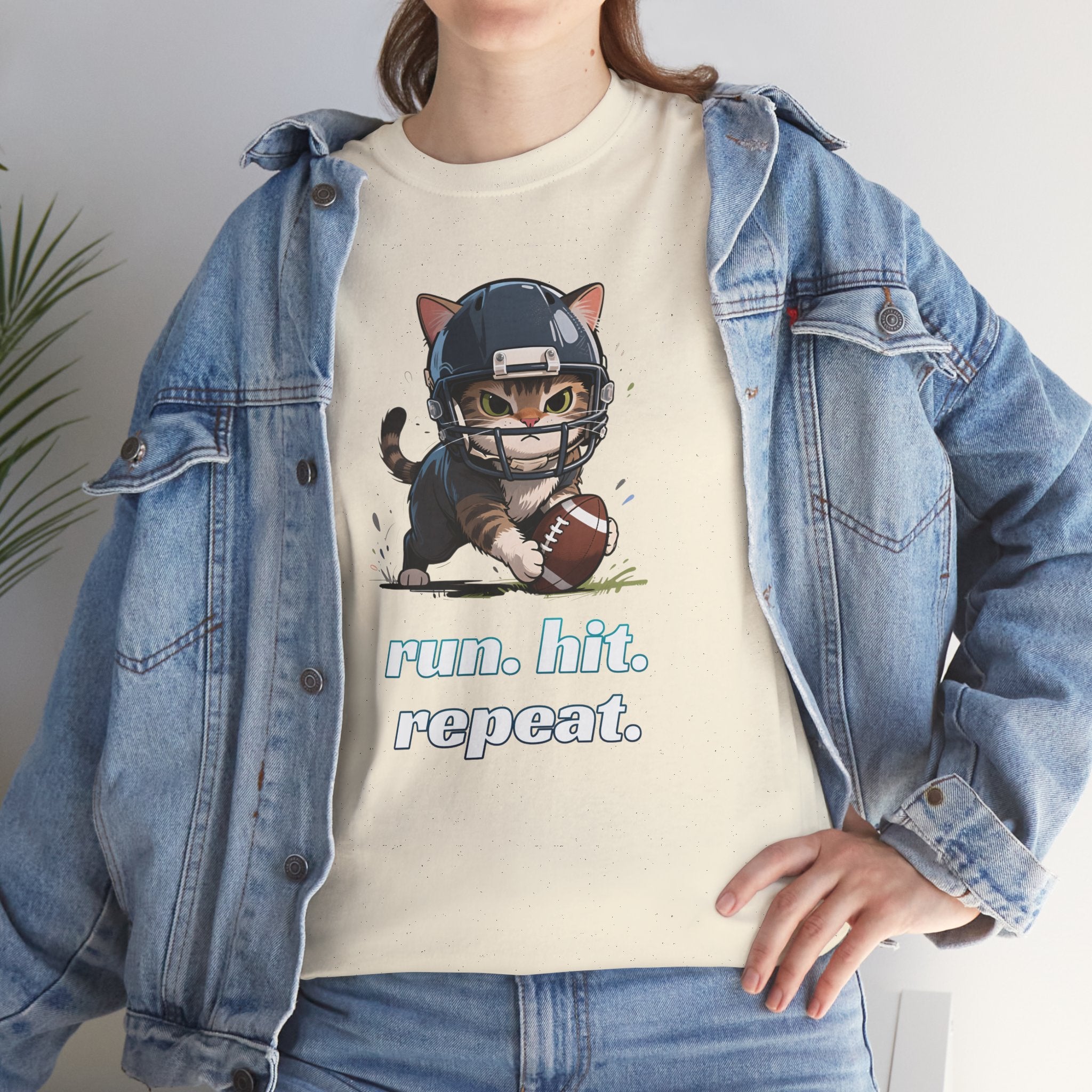 Funny Football Cat T-Shirt — "Run. Hit. Repeat." Cute Helmet Kitten Tee for Football Fans