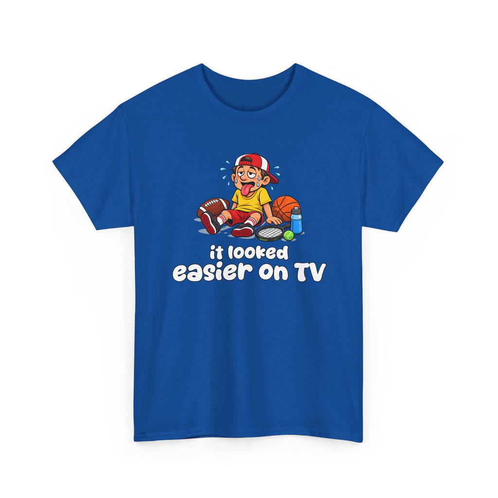 Blue t-shirt with a sports graphic of a cartoon character and text 'it looked easier on TV' on a white background