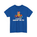 Blue t-shirt with a sports graphic of a cartoon character and text 'it looked easier on TV' on a white background