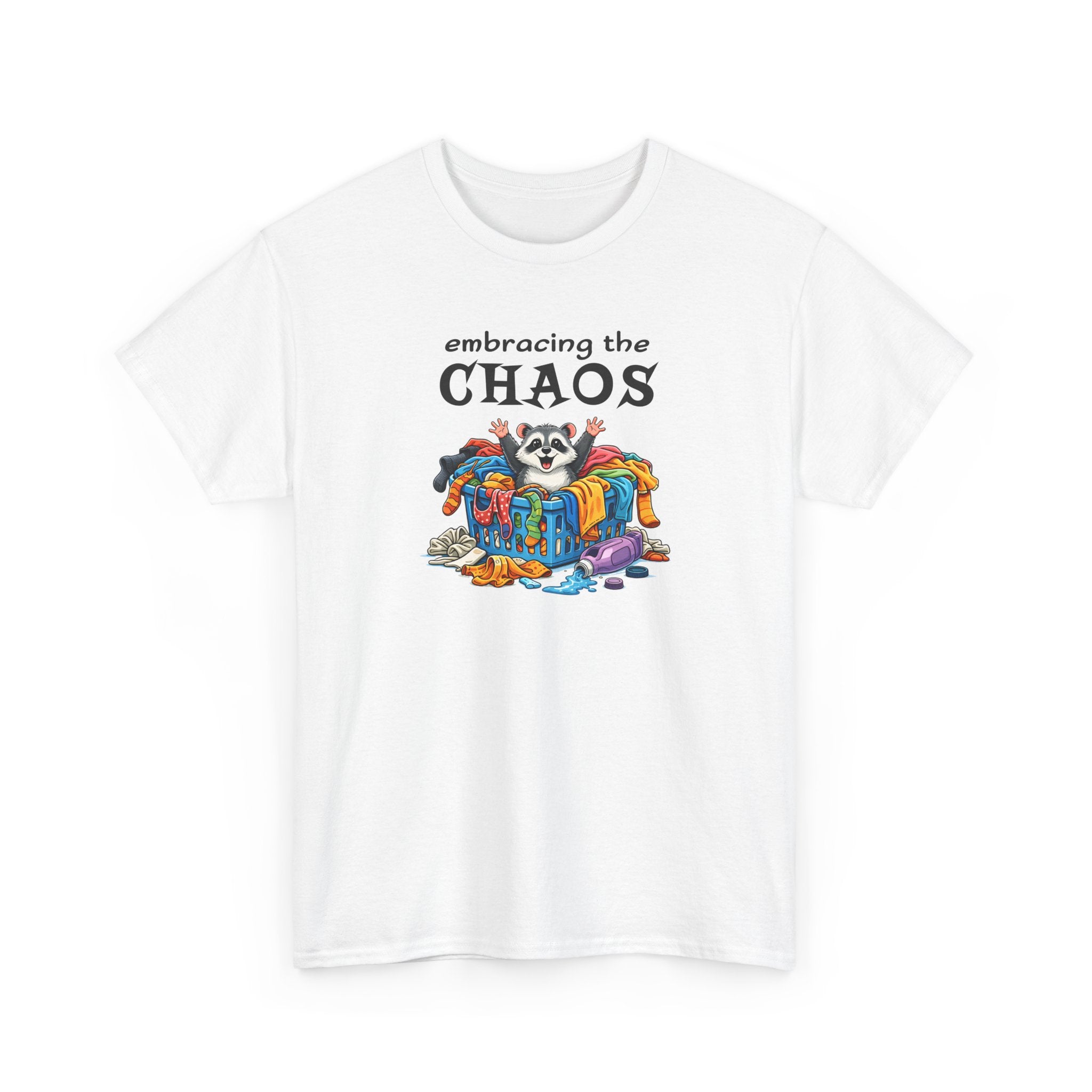t-shirt with colorful graphic of a raccoon in a basket of laundry and 'embracing the CHAOS' text on a white background