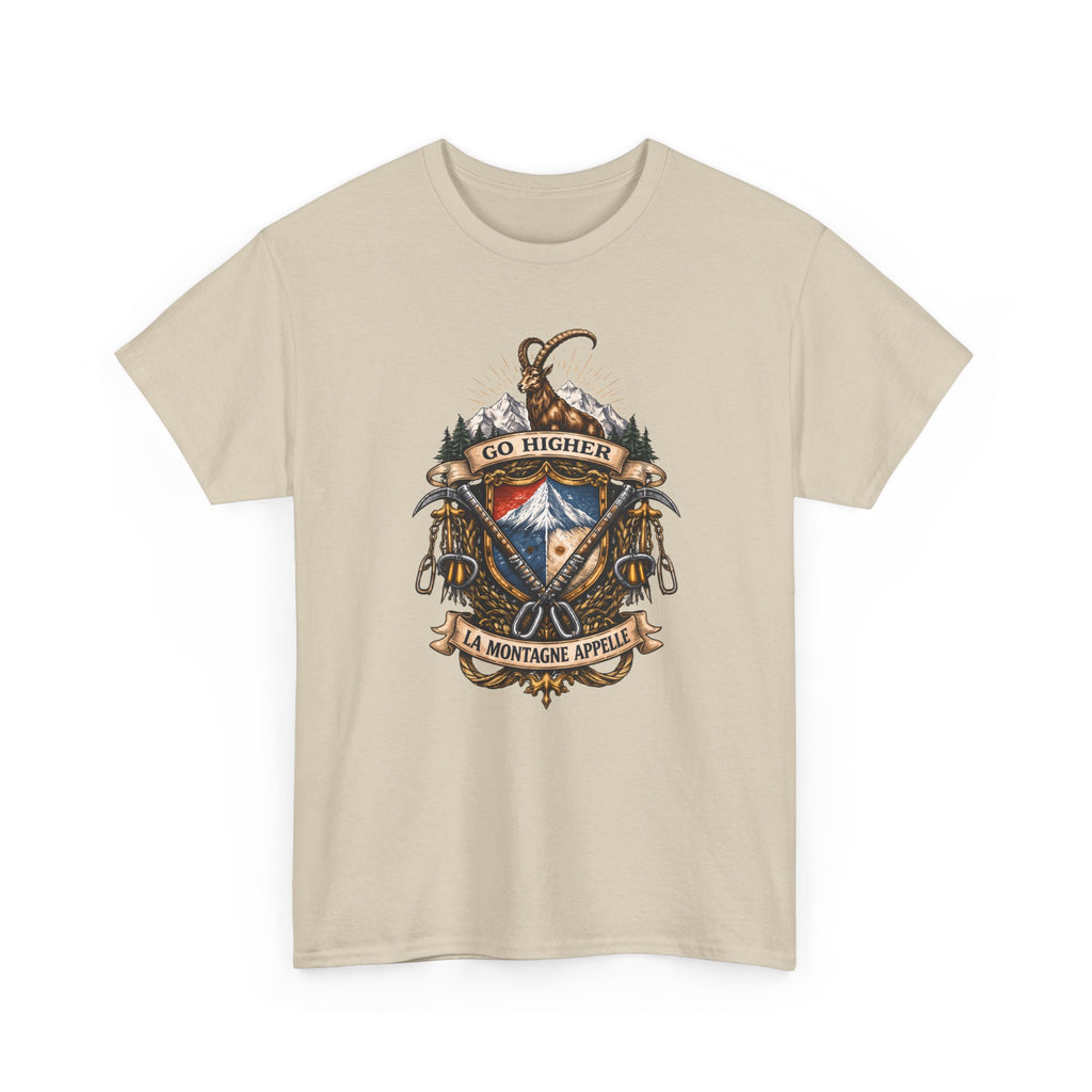 Beige t-shirt with mountain-themed graphic of ibex and mountain climbing gear and text 'go higher the mountain is calling' on a white background
